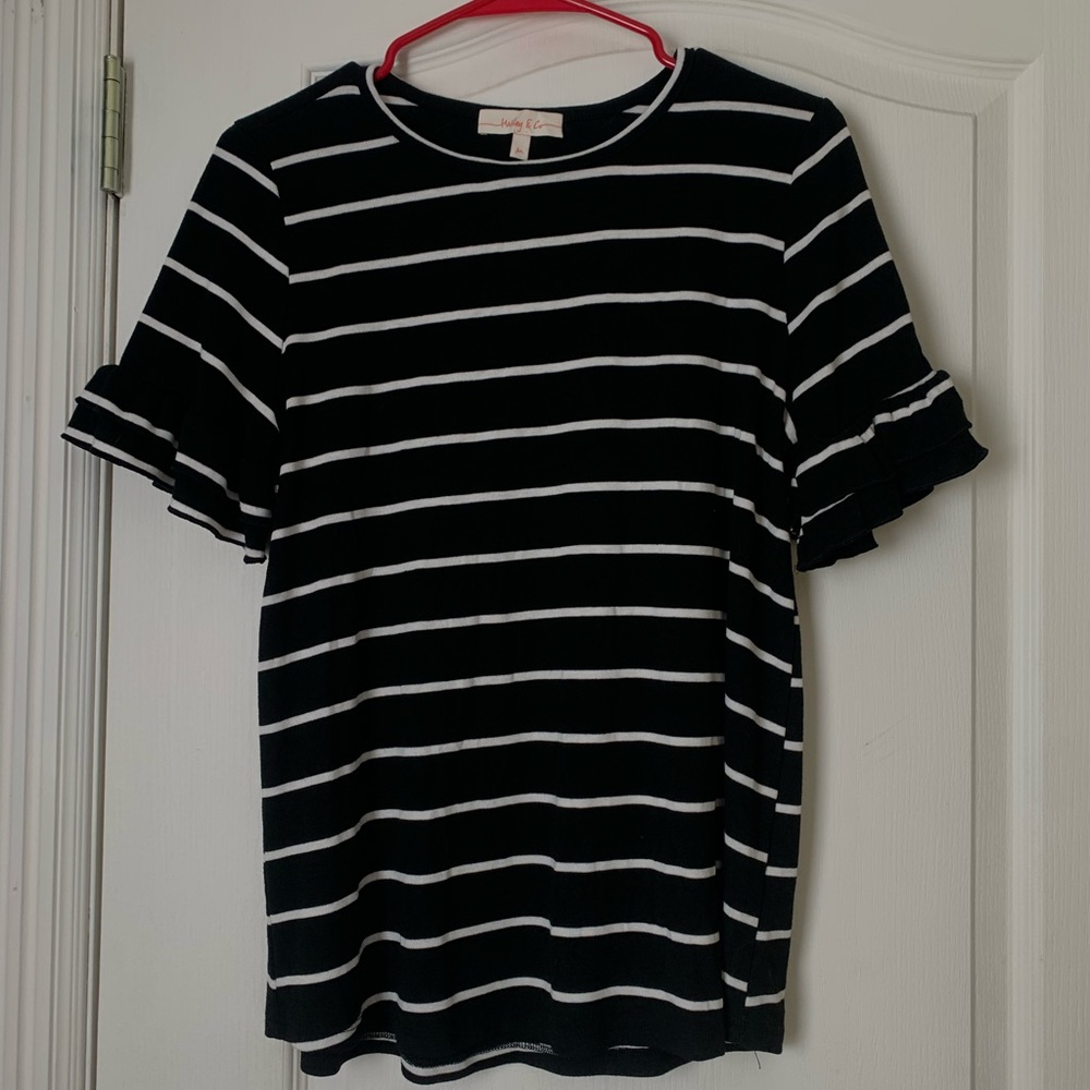 This is a nice top with ruffled sleeves that would perfectly with jeans!